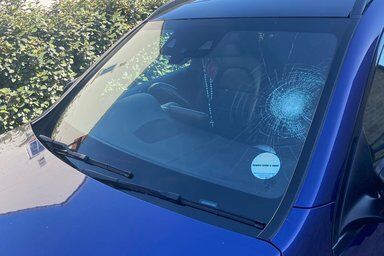 Vandalism on a bmw windscreen with ADAS equipment